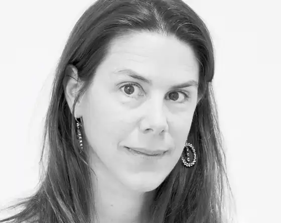 Dr. Filipa Osorio, a softly smiling woman with long straight brown hair.